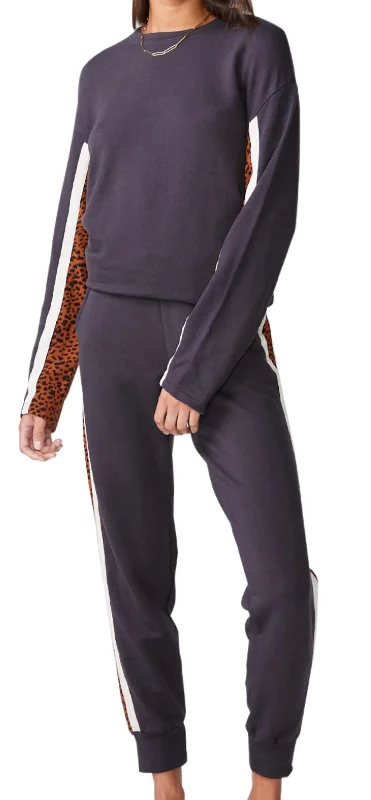 Urban tight trousers for men with street-style influence and sharp tailoring -Paneled Mini Leopard Sweatpants In Faded Black