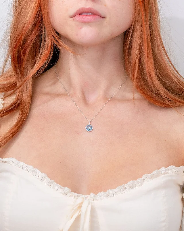 Best necklaces and pendants with heart-shaped designs for a romantic look-2.25ct Blue Topaz & Diamond Halo Necklace