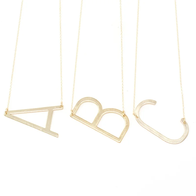 Necklaces and pendants with pearls for a classic and sophisticated touch-Initial Necklace - Gold Sideways